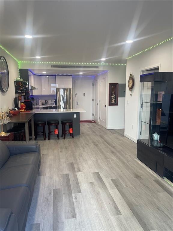 living room featuring light wood-type flooring