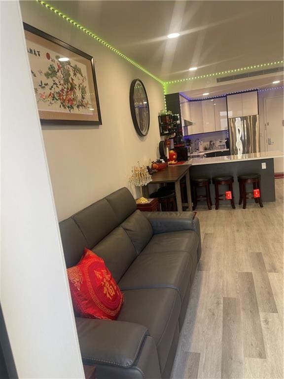 living room featuring light wood-type flooring