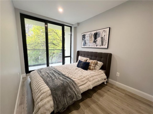 bedroom featuring light hardwood / wood-style flooring