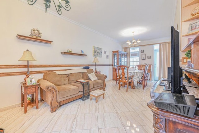 living room featuring a chandelier and crown molding