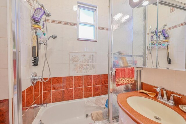522 Bay Ridge Ave, Brooklyn, NY 11220 - bathroom with bath / shower combo with glass door and vanity