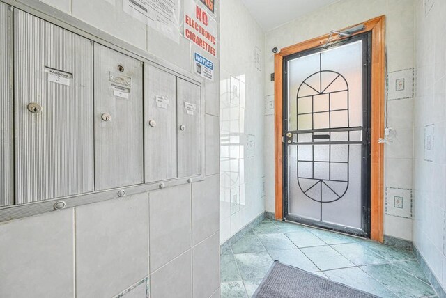 522 Bay Ridge Ave, Brooklyn, NY 11220 - foyer entrance with light tile patterned flooring