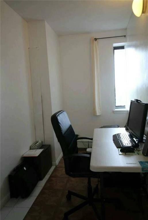 office space featuring tile patterned floors