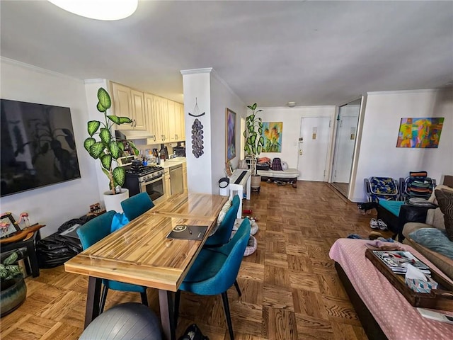 dining area with dark parquet flooring and crown molding