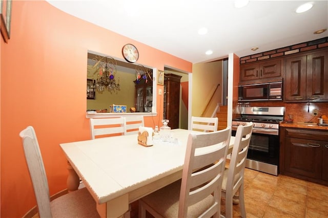 dining room featuring light tile patterned floors