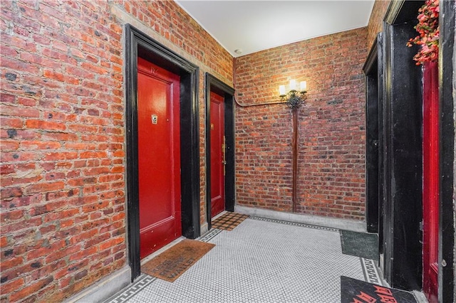 hall with brick wall