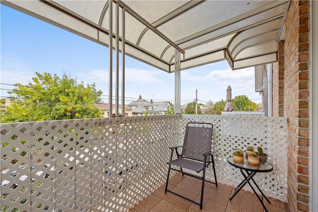 view of patio with a balcony