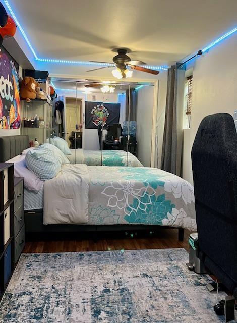 bedroom with wood finished floors