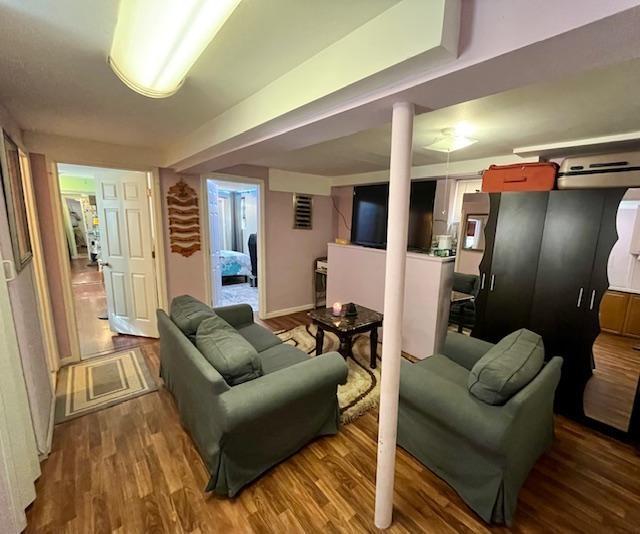 living room with hardwood / wood-style flooring