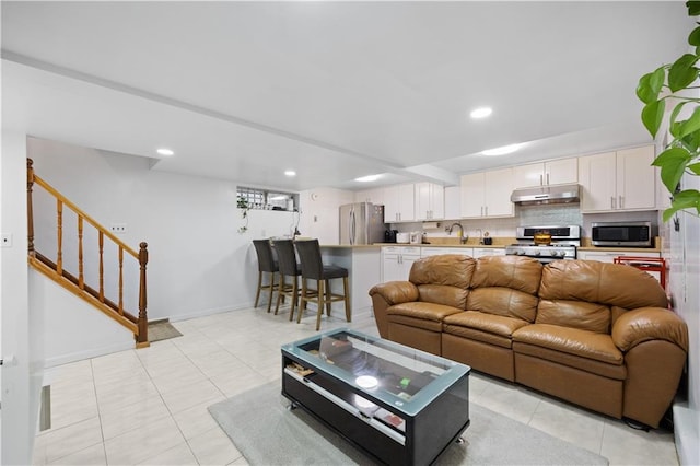 tiled living room with sink