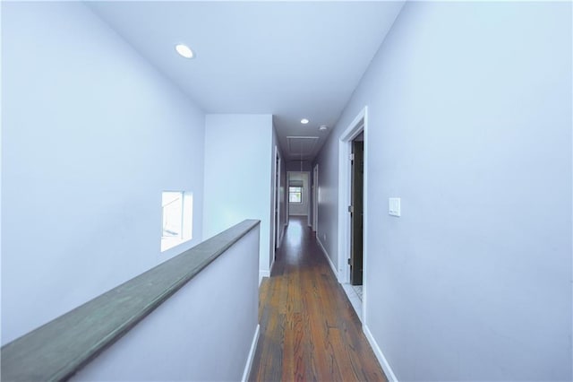 hallway featuring dark hardwood / wood-style floors