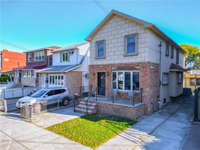 view of front of house with central AC unit