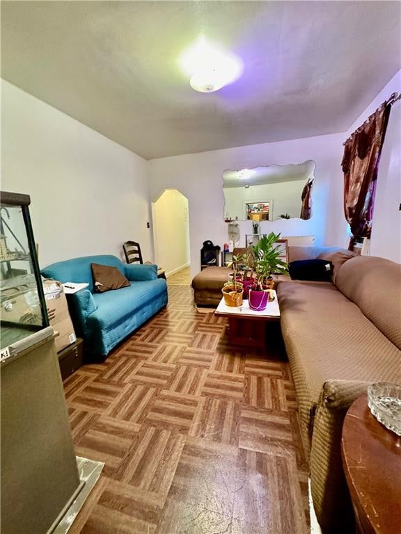 living room featuring light parquet flooring