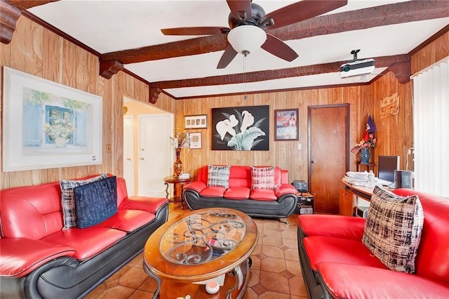 living room with beamed ceiling, tile patterned floors, ceiling fan, and wood walls