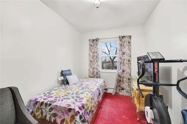 bedroom featuring carpet floors, a baseboard radiator, and vaulted ceiling