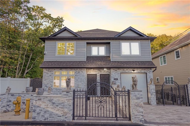 view of front of house with a garage