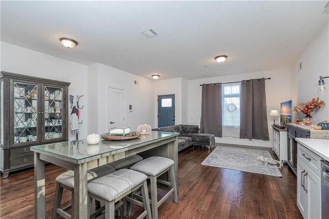 dining room featuring dark hardwood / wood-style floors