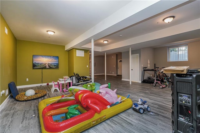 playroom with hardwood / wood-style floors