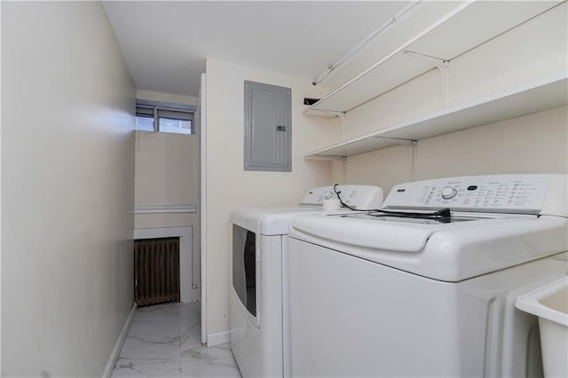 clothes washing area featuring electric panel and independent washer and dryer