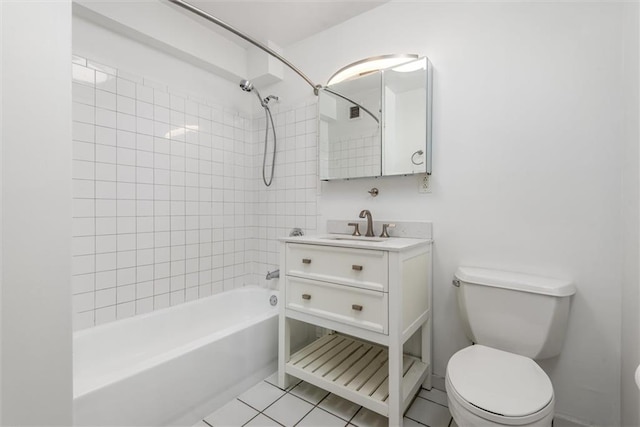 full bathroom featuring vanity, shower / bath combination, tile patterned flooring, and toilet