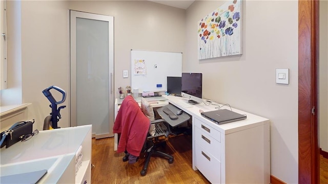 home office featuring wood finished floors