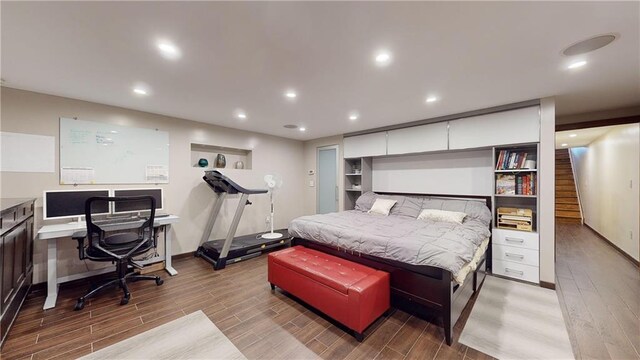 bedroom with wood-type flooring