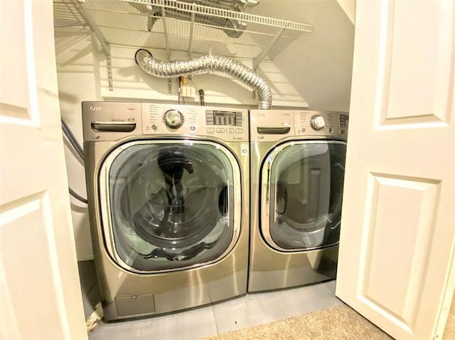 laundry area with washer and clothes dryer