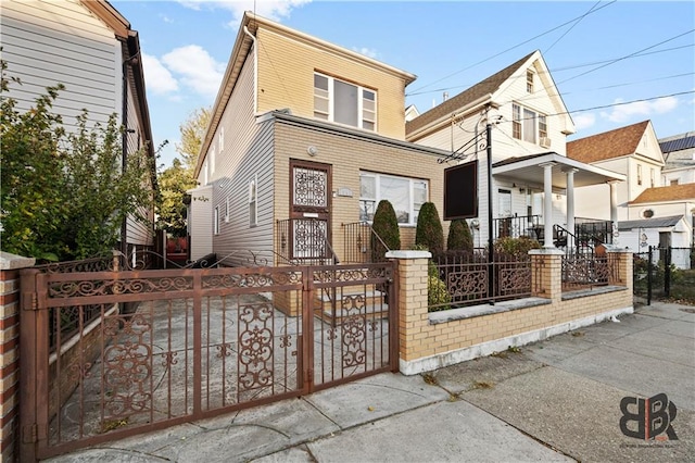 view of front property featuring covered porch