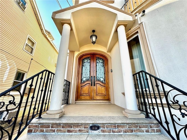 entrance to property featuring french doors