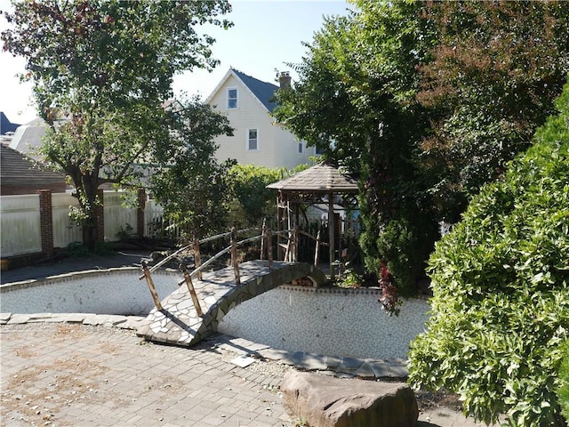 view of swimming pool featuring a gazebo