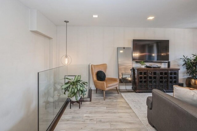 living room with light hardwood / wood-style floors