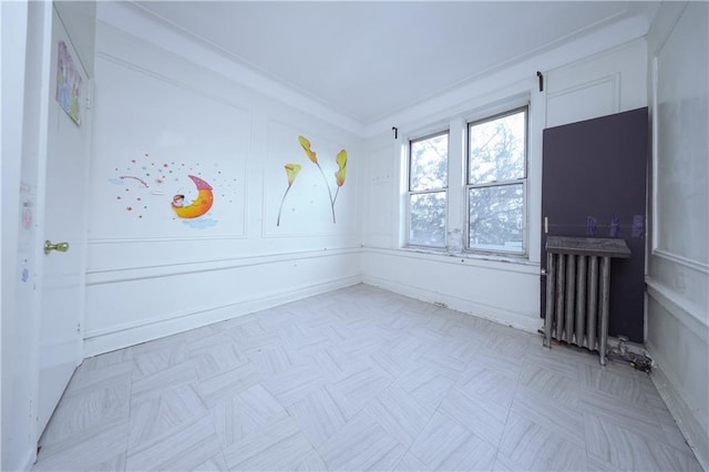 unfurnished room with radiator