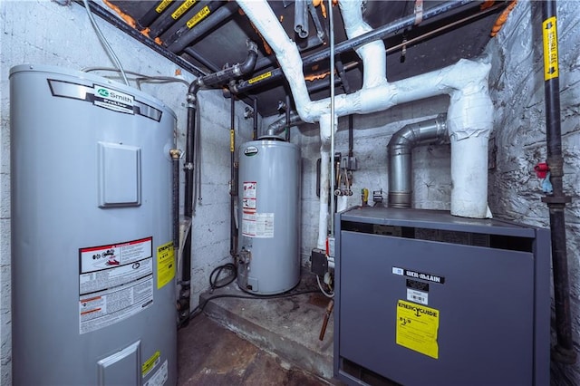 utility room with gas water heater and electric water heater