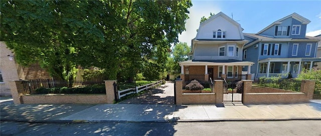 view of front of property featuring covered porch