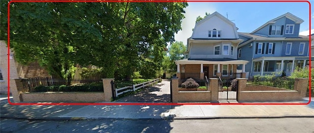 view of front of home featuring covered porch