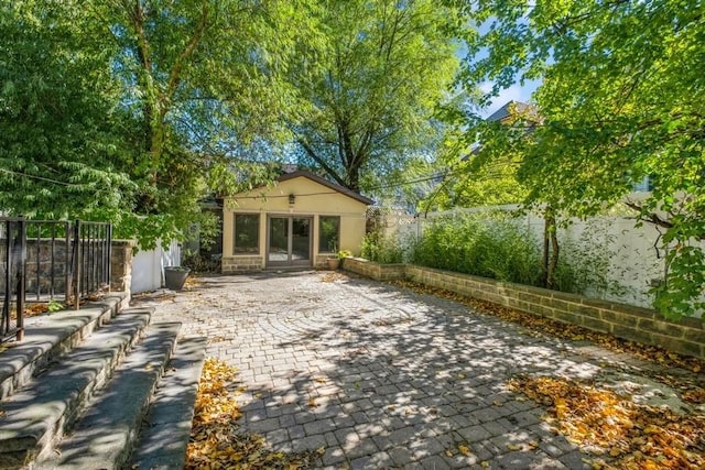 view of patio with an outdoor structure