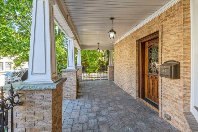 view of patio featuring a porch