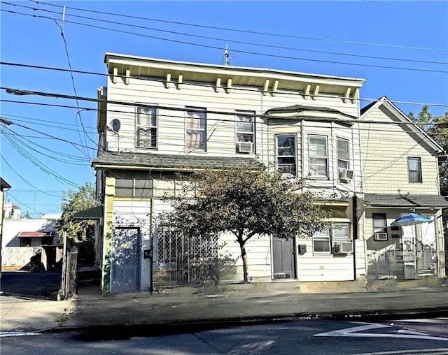 view of front of home featuring cooling unit