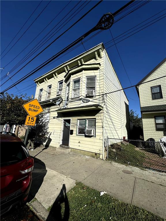 view of front of home featuring cooling unit