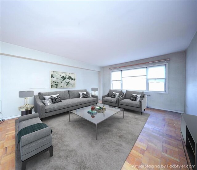 living room featuring parquet flooring