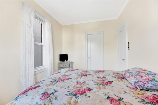 bedroom with ornamental molding