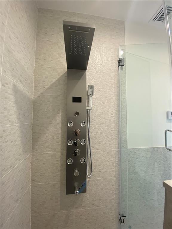 details with visible vents and a shower stall