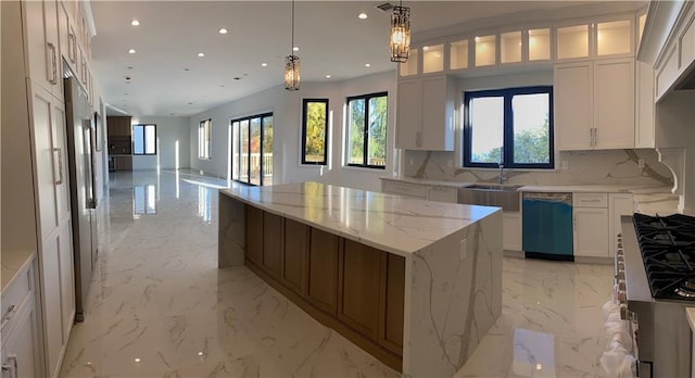 kitchen with recessed lighting, marble finish floor, dishwasher, tasteful backsplash, and open floor plan