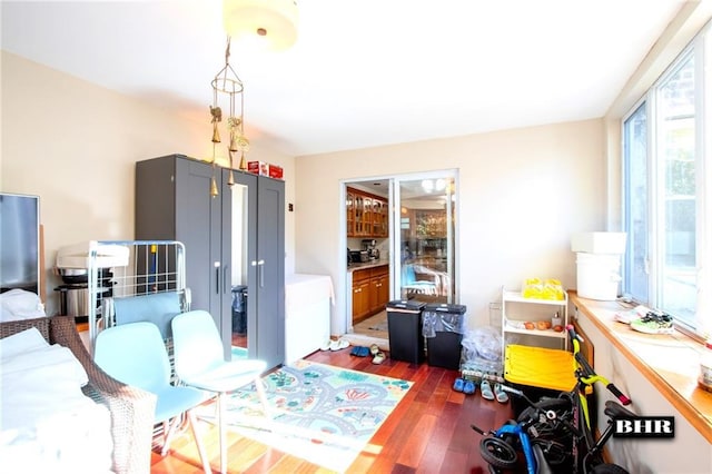 dining area with dark wood-type flooring