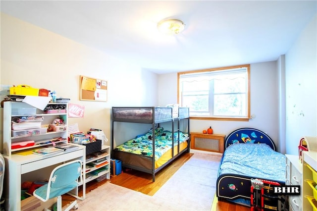 bedroom with light hardwood / wood-style flooring