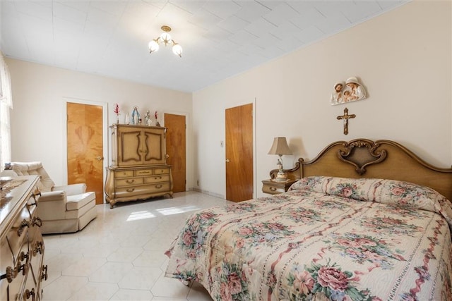 bedroom featuring light tile patterned floors