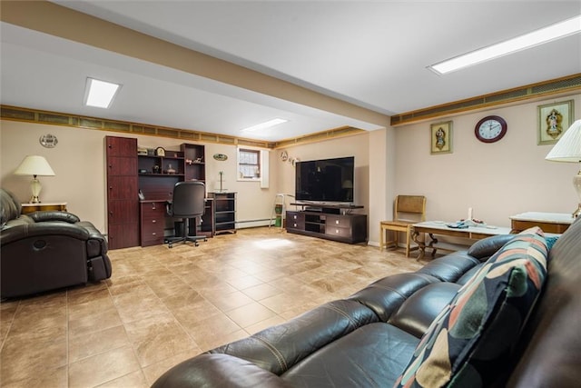 living room with light tile patterned floors and baseboard heating