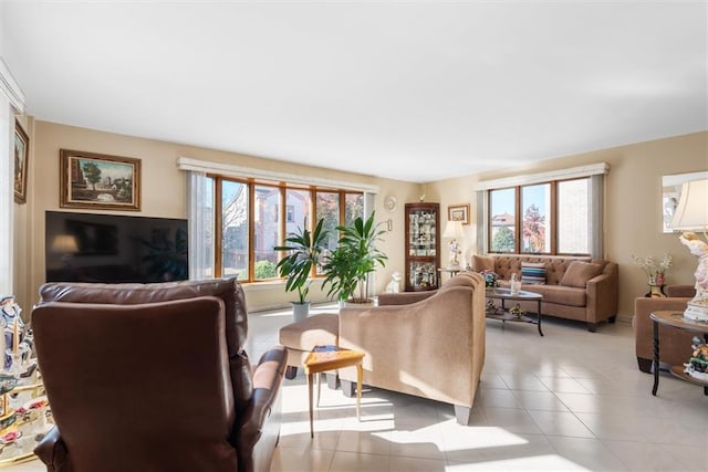 tiled living room with a wealth of natural light