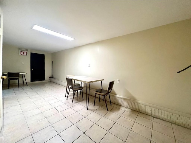 dining area with light tile patterned floors