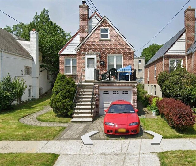 view of front of property with a garage